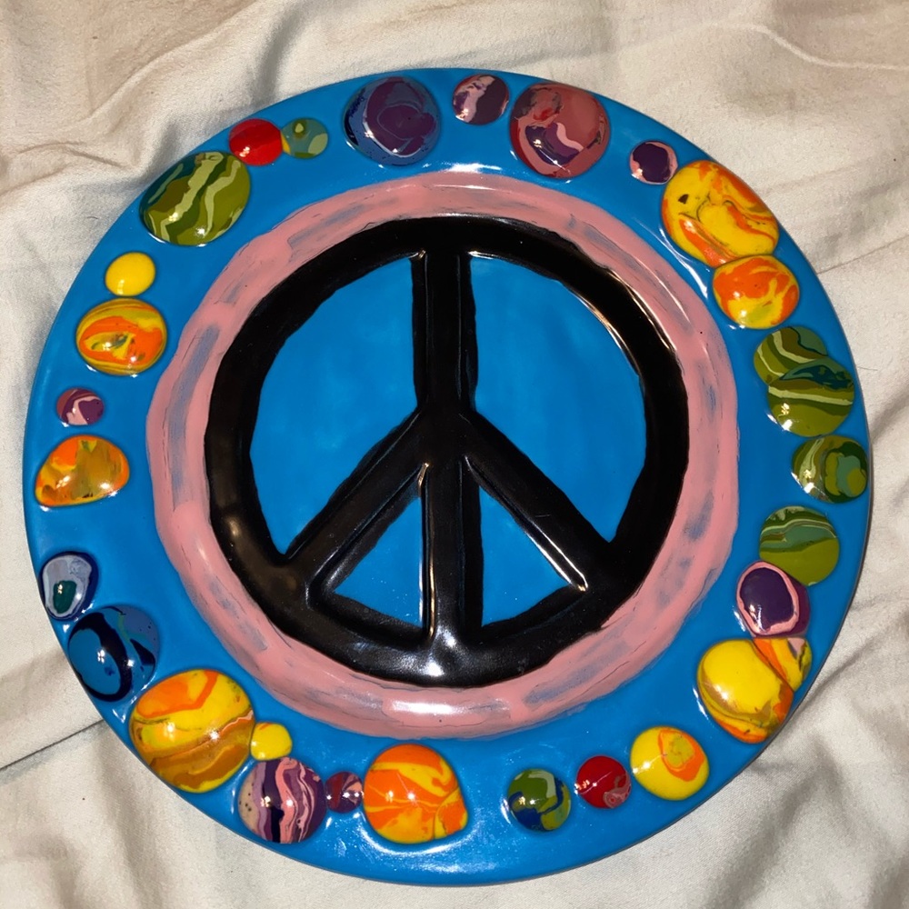 Hand painted clay peace sign plate
